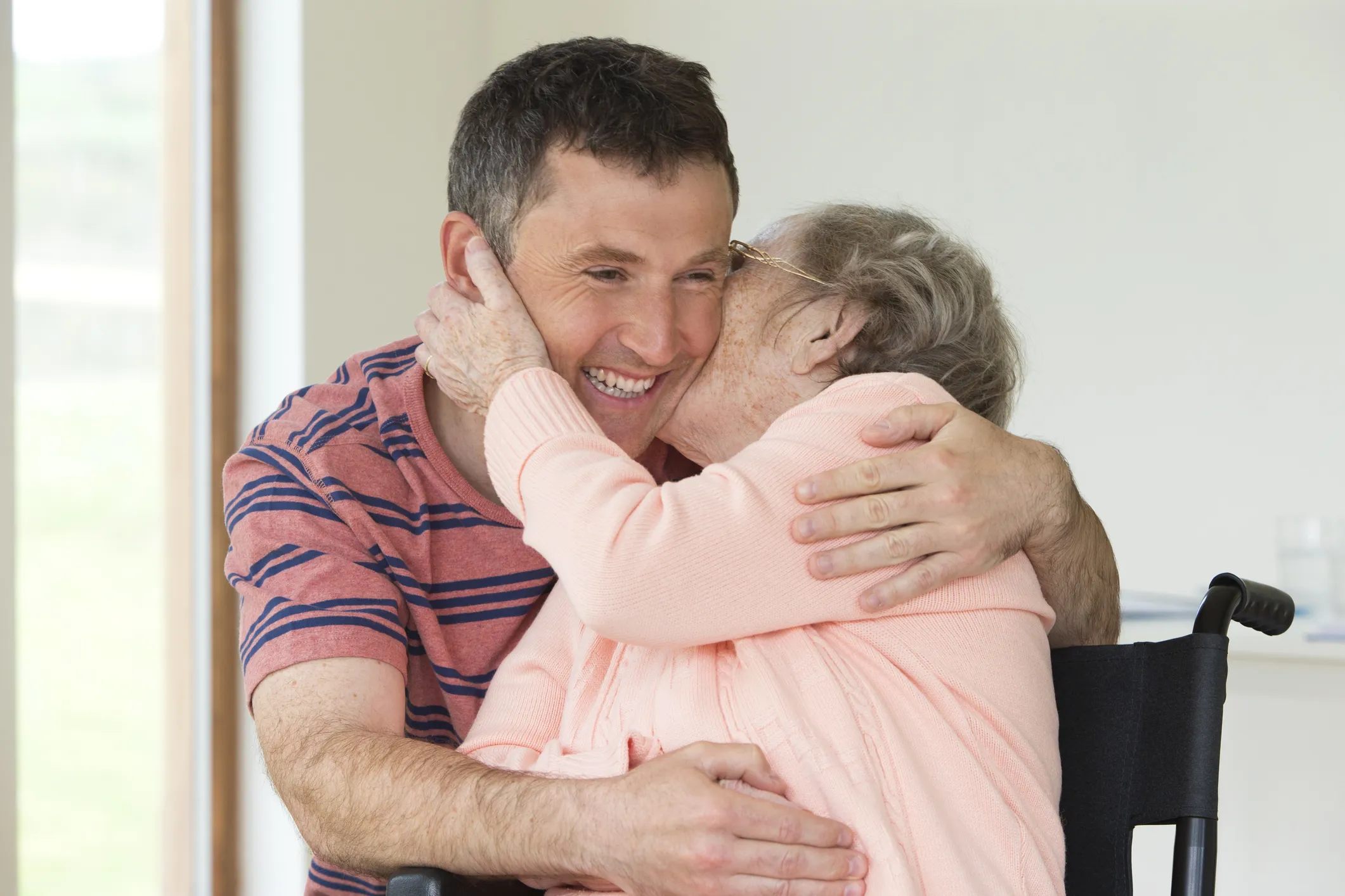 Happy Senior Resident with Son
