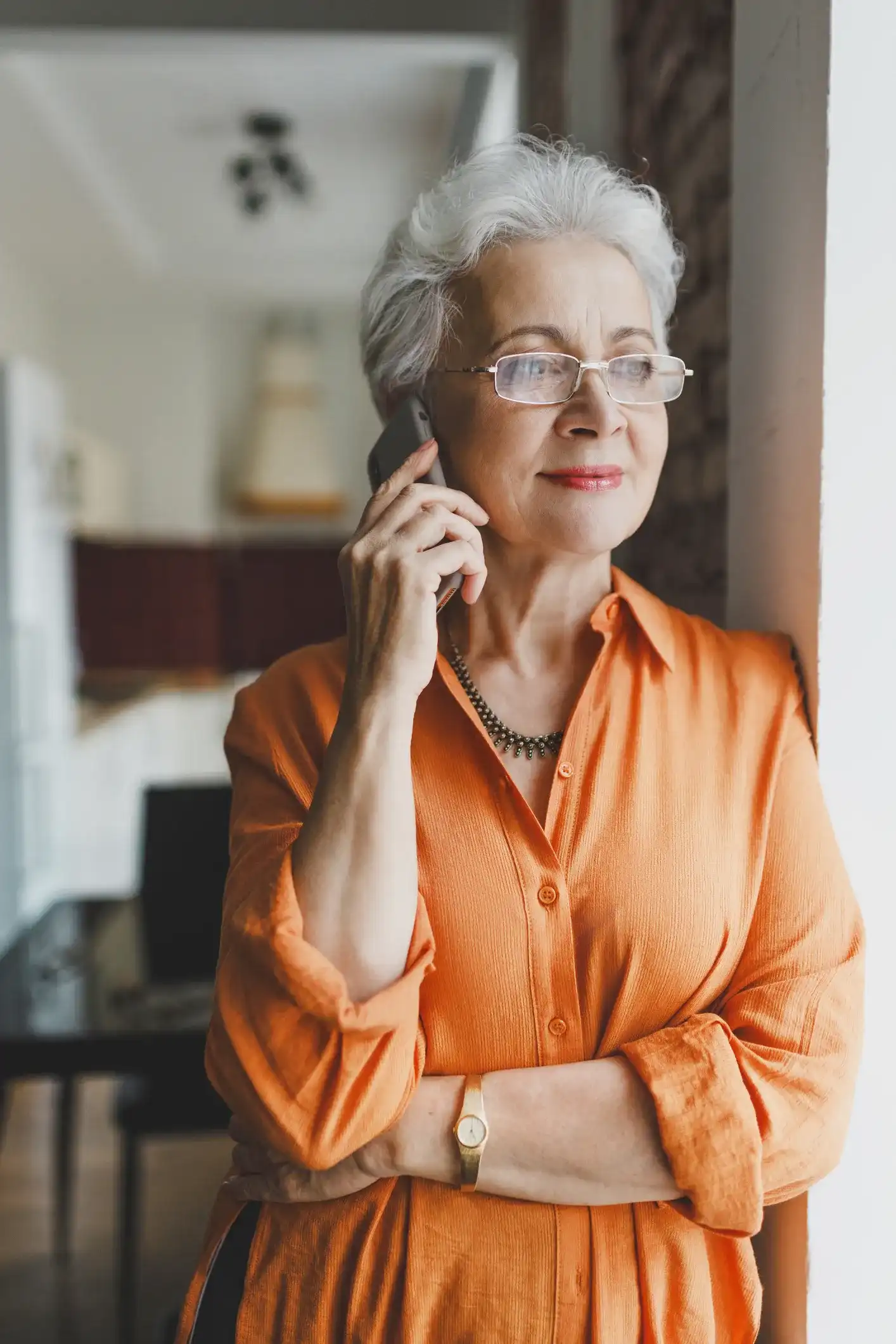Senior resident on phone in Kingsport assisted living Senior woman talking on phone in assisted living community in Kingsport TN